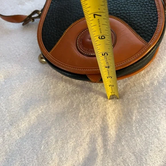 Dooney & Bourke All Weather Leather Black & Tan Saddle Crossbody Bag. - Picture 9 of 9